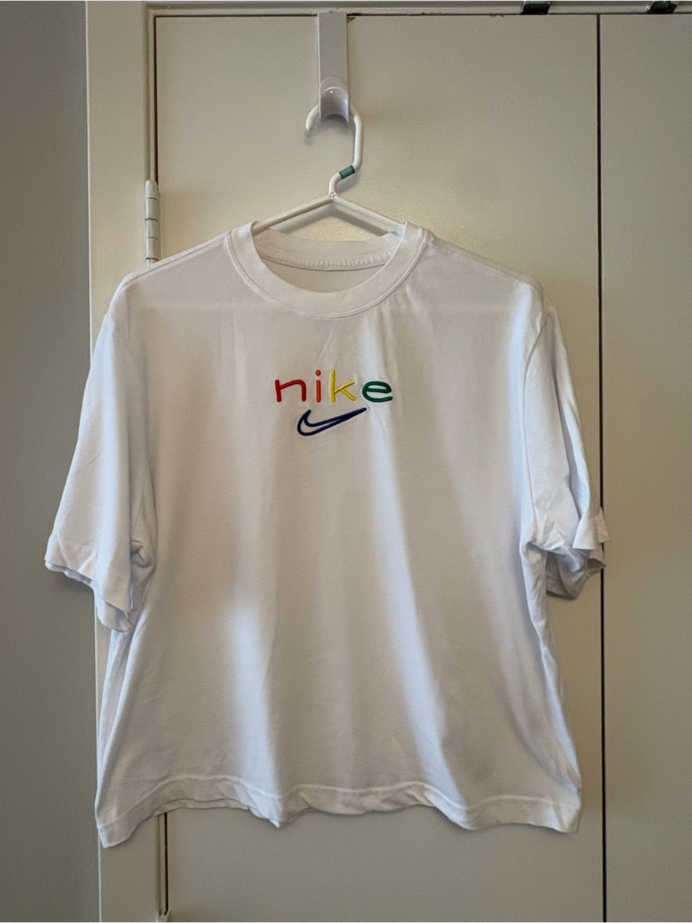 Nike Pride Collection White Tee with Rainbow Script & Navy Swoosh